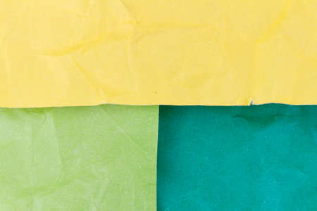 yellow and green crumpled paper texture background.の写真素材