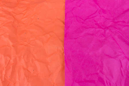 pink and orange crumpled paper texture background.