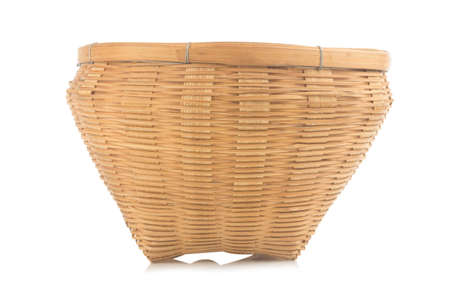 empty wicker basket on white background.の写真素材