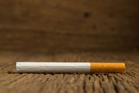 Tobacco cigarette on a  wooden.の写真素材