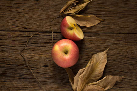 apple on old wooden. morning.の写真素材