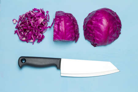 Purple Cabbage half and slice. knife. isolated on white background.の写真素材