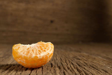 tangerine. sweet orange. on wooden. texture wooden.の写真素材
