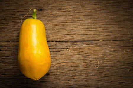 papaya fruit. old wooden. moring. sunset. art. asian.の写真素材