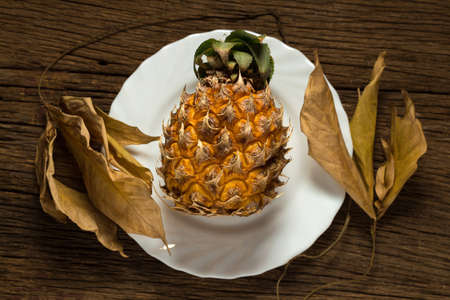 pineapple on wooden.の写真素材