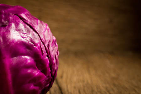 cabbage purple on wooden. kitchen. morning. closeup.