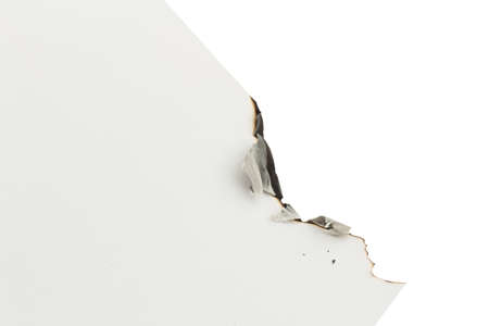 burned white paper on a white background. space.の写真素材