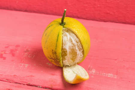 Bergamot oranges color yellow on old wood.の写真素材