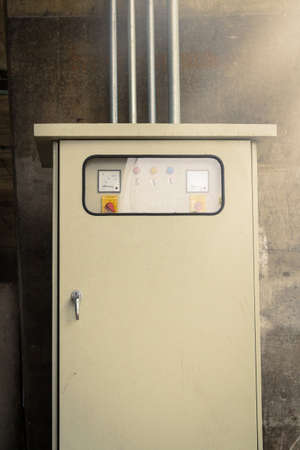 cabinets electric control on concrete. under the bridge. sunshine