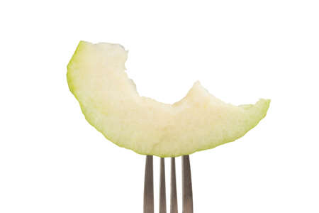 guava fruit on fork isolated on white background.の写真素材