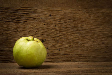 Guava on old wood.の写真素材