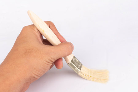 brush isolated on white background construct hand.の写真素材