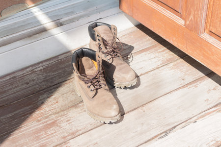 Leather boots home floor shoes wood.の写真素材