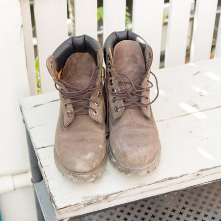 Leather boots home floor shoes wood.