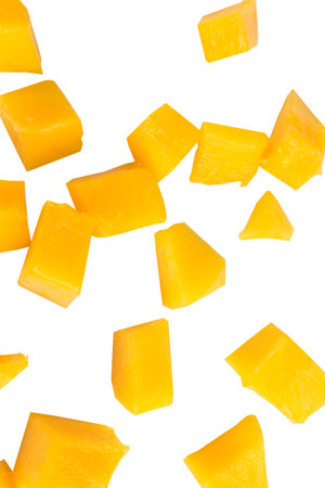 Fruit pulp cube piece mango fall isolated on white background.の写真素材