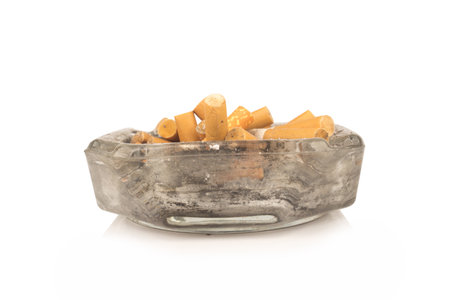 Ashtray butts cigarette on white.の写真素材