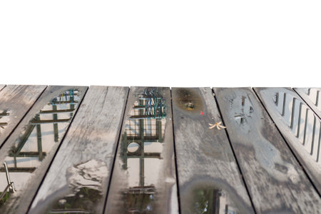 Wet wooden floor house water brown.の写真素材