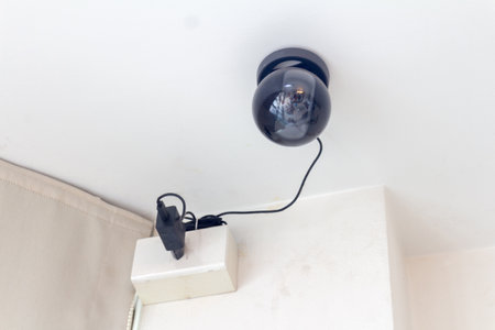 Black CCTV camera in the house.の写真素材