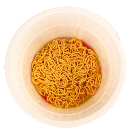 Instant noodle cup high angle on white background.の写真素材