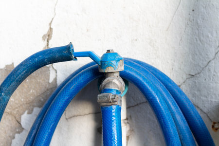 Blue Rubber Boots for Sale Beside House in the Evening.の写真素材
