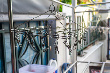 Aluminum Clothespin Hanging on Aluminum Drying Rack.