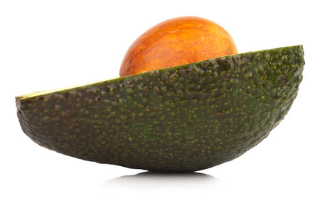 Avocado sliced seed pile fall drop slide scatter splash.の写真素材
