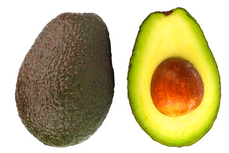 Avocado sliced seed pile fall drop slide scatter splash.