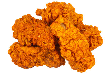Spicy crispy fried chicken drumsticks isolated on white background.の写真素材