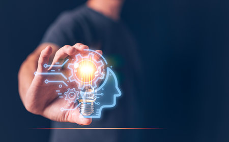 idea creative innovation concept, man holding light bulb with icon show new ideas concept.の写真素材