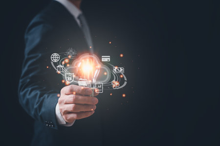 businessman holding Light bulb with cloud computing Global Internet connection.  global internet connection application technology and digital marketing, Financial and banking, Digital link tech, big data.の写真素材