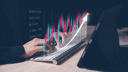 Analyst working with Business Analytics and Data Management System on graph make a report with KPI and metrics connected to database. Corporate strategy for finance, operations, sales, marketingの写真素材