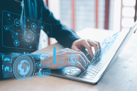 man use Laptop with cloud computing diagram and data chart world network. Cloud technology. Data storage. Networking and internet service concept.の写真素材