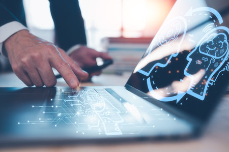 AI technology concept, man using AI tech to working business project, businessman working on computer laptop and books to analyst and develop business growthの写真素材