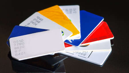 Colorful sim card on a black background close up