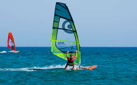 Rhodes, Greece - August 08, 2018: Windsurfing, sailing on the island of Rhodes, Greeceの写真素材