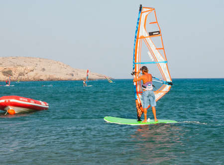 Rhodes, Greece - August 08, 2018: Windsurfing, sailing on the island of Rhodes, Greeceの写真素材
