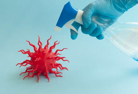 Covid-19 blue abstract background. Dangerous Coronavirus distribution model and hand. Pandemic...