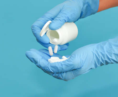 Use of gloves during treatment with coronovirus. use of gloves when taking medication.