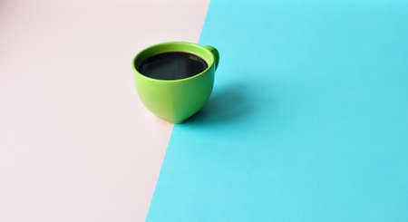 Americano in cups on the pink background. Flat Lay, cheerful day concept. This image could be used to show coffee break time or morning as a part of working dayの写真素材