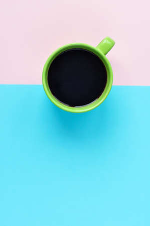 Americano in cups on the pink background. Flat Lay, cheerful day concept. This image could be used to show coffee break time or morning as a part of working dayの写真素材