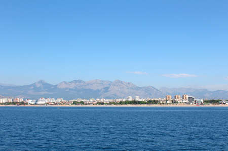 Sea and resort town of mountains in the background  Antalya, Turkeyの写真素材