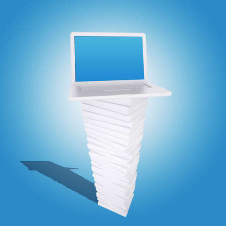 Laptop on a pile of white books  Blue background  Laptop screen is emptyの写真素材
