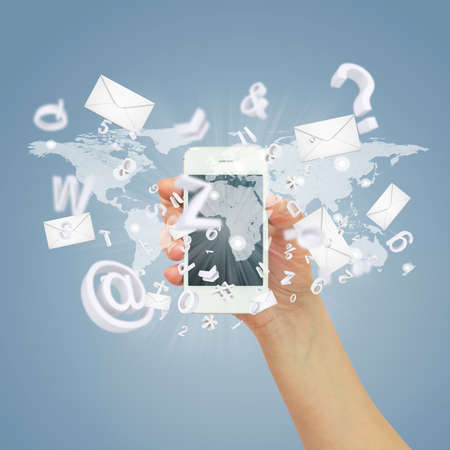 Hand holding a smartphone  Letters and envelopes are emitted from the screen of smartphone  Concept...