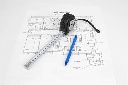 Construction drawing, tape measure and pen  Desk builder