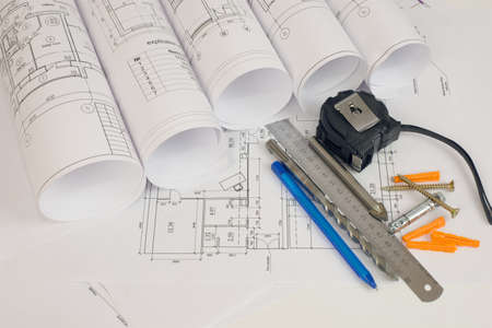 Construction drawings, tape measure, ruler, drills, pen and screws  Desk builderの写真素材