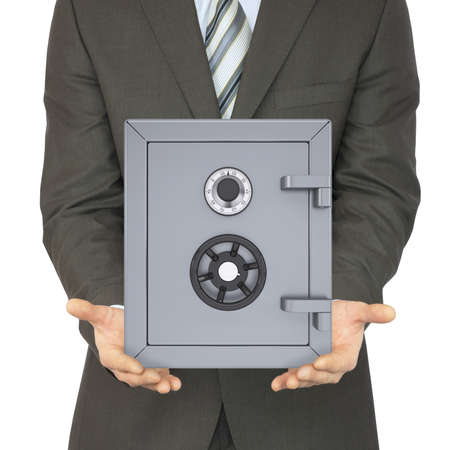 Man in a suit holding a safe  Isolated on white background  safety conceptの写真素材