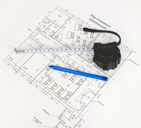 Construction drawing, tape measure and pen  Desk builder
