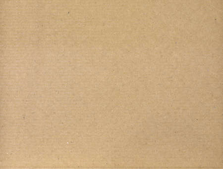 Surface texture yellow cardboard  The packaging materialの写真素材