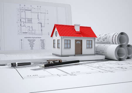 Scrolls architectural drawings and small house  architect conceptの写真素材