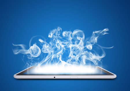 Tablet pc emits white smoke  The technology concept